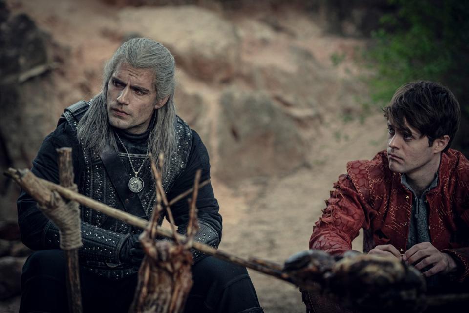 henry cavill as geralt of rivia, joey batey as jaskier, the witcher season 1