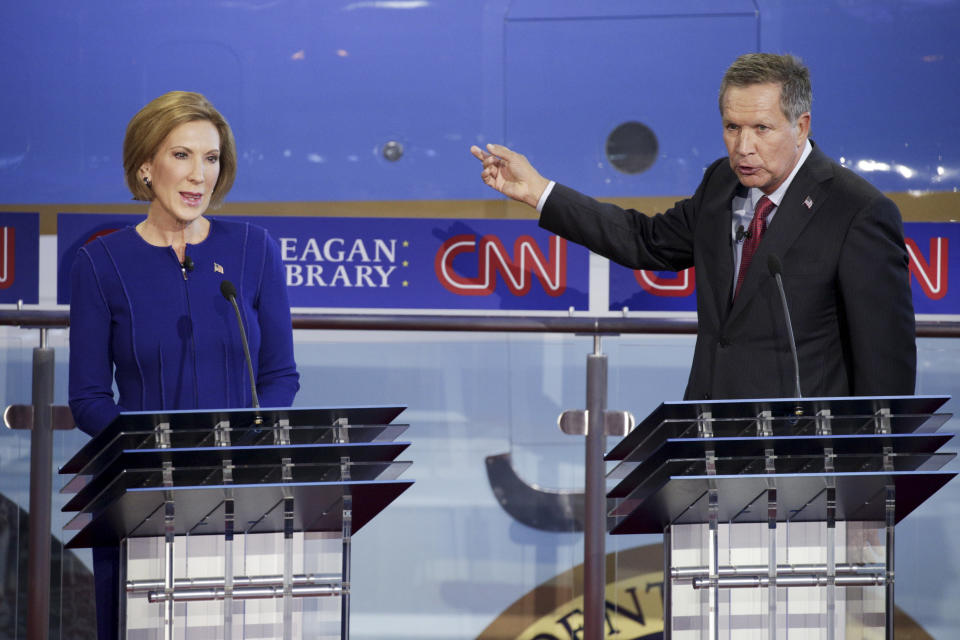 Carly Fiorina, former chairman and CEO&nbsp;of Hewlett-Packard Co. and 2016 Republican presidential candidate, left, and John Kasich, governor of Ohio and 2016 Republican presidential candidate, participate in the Republican presidential debate at the Ronald Reagan Presidential Library in Simi Valley, California, on Sept. 16, 2015.