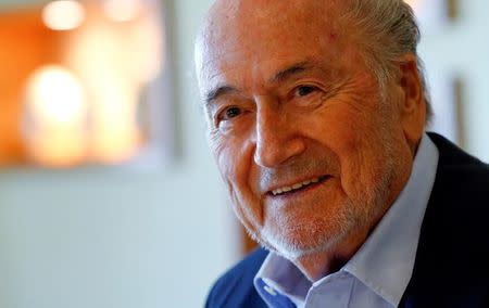 FILE PHOTO: Former FIFA President Sepp Blatter smiles during an interview in Zurich, Switzerland April 21, 2017. REUTERS/Arnd Wiegmann