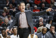 Cincinnati Bearcats head coach John Brannen directs his players from the bench during the second half of an NCAA college basketball game against East Carolina, Sunday, Jan. 19, 2020, in Cincinnati. (AP Photo/John Minchillo)