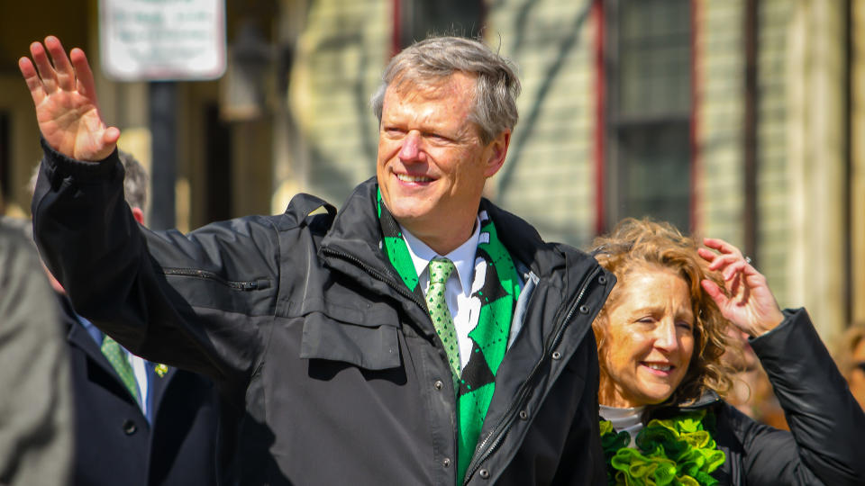 Boston,MA - 3/17/19: Massachusetts Governor Charlie Baker and wife Lauren march with other politicians in the St Patrick's Day Parade