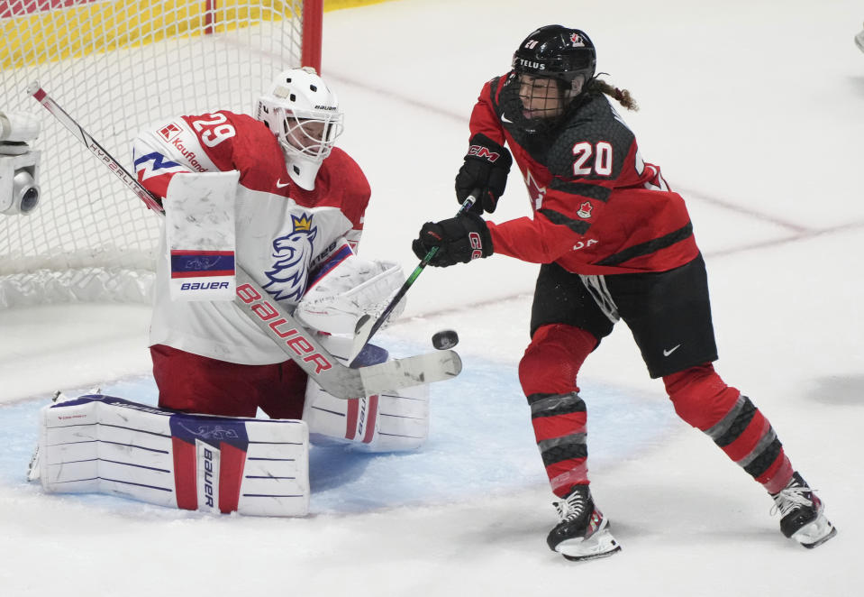 Czechia goaltender Klara Peslarova (29) stops a shot by Canada's Sarah Nurse (20) during the third period wld