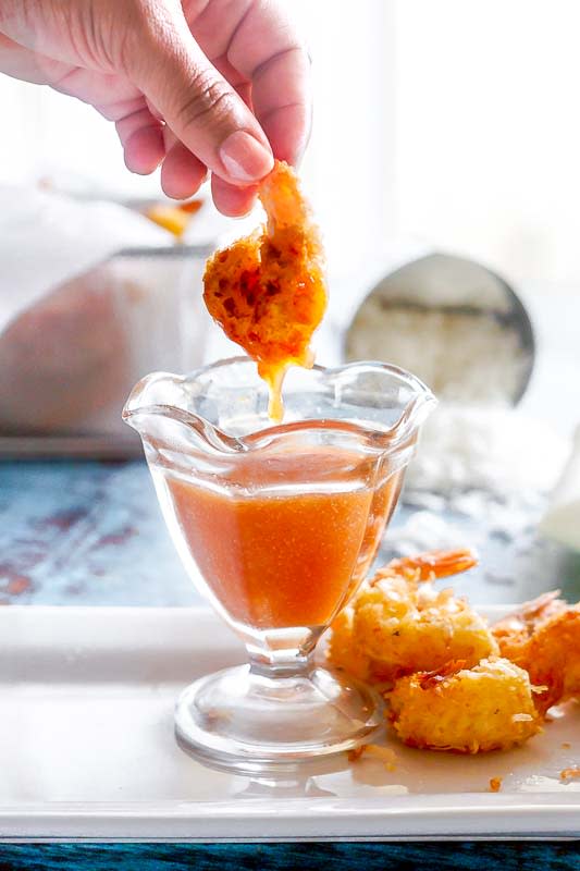 <p>Sweet Tea + Thyme</p><p>Crowd-pleasing coconut shrimp are crispy little bites of golden-brown deep-fried goodness with juicy jumbo shrimp inside. This recipe is super easy, quick to whip up, and served with the tangy, sweet, and savory coconut shrimp sauce that everyone loves.</p><p><strong>Get the Recipe: <a href="https://www.sweetteaandthyme.com/coconut-shrimp-dipping-sauce/" rel="nofollow noopener" target="_blank" data-ylk="slk:Coconut Shrimp + Dipping Sauce;elm:context_link;itc:0;sec:content-canvas" class="link ">Coconut Shrimp + Dipping Sauce</a></strong></p>
