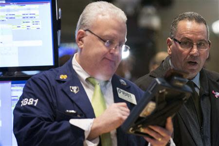 Traders work on the floor of the New York Stock Exchange March 6, 2014. REUTERS/Brendan McDermid