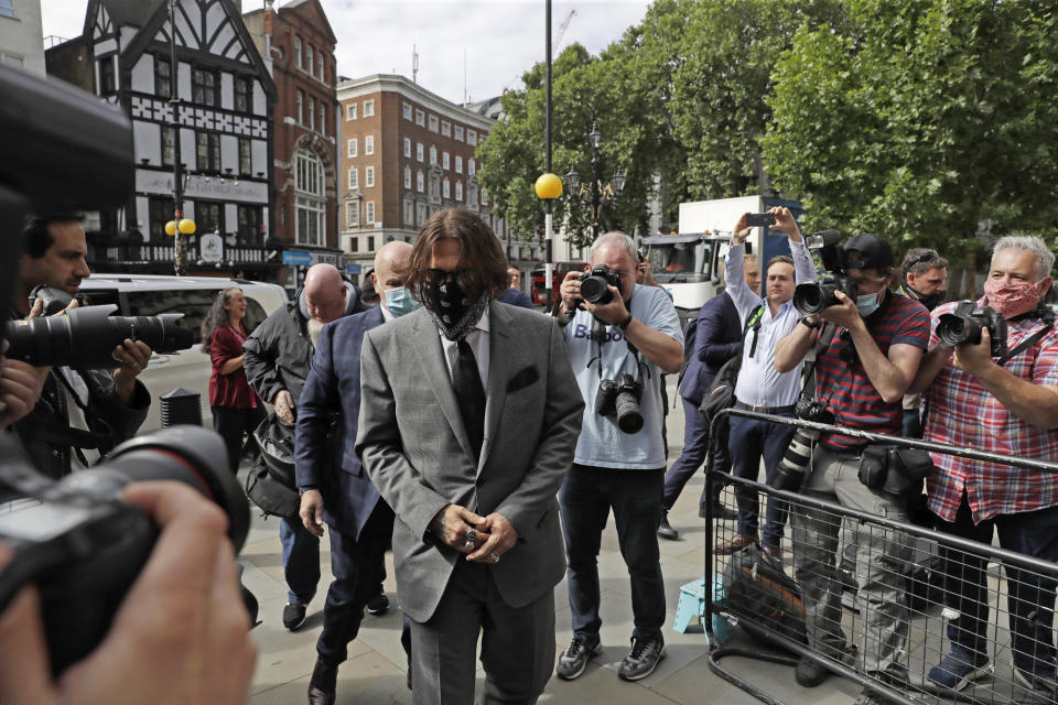American actor Johnny Depp arrives at the High Court in London, Monday, July 13, 2020. Depp is expected to wrap up his evidence at his libel trial against a tabloid newspaper that accused him of abusing ex-wife Amber Heard. The Hollywood star is suing News Group Newspapers, publisher of The Sun, and the paper’s executive editor, Dan Wootton, over an April 2018 article that called him a “wife-beater.” (AP Photo/Matt Dunham)