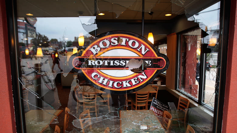 Peeling Boston Chicken sign