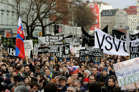 Demonstrators attend a protest rally in reaction to the murder of Slovak investigative reporter Jan Kuciak and his fiancee Martina Kusnirova, in Bratislava, Slovakia, March 16, 2018. REUTERS/David W. Cerny