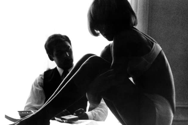 WEEKEND, Mireille Darc (on desk), 1967 - Credit: Everett Collection