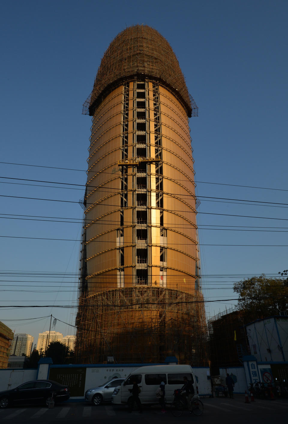 The headquarters of the People's Daily newspaper in Beijing, China, gave people the shaft daily while it was under construction. Sadly, the <a href="http://shanghaiist.com/2014/01/23/peoples-daily-building-complete-no-longer-penis-like.php" target="_blank">finished building became this</a>.  