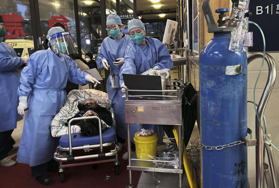 Chinas health care system has been struggling to cope with a surge of COVID-19 infections since the government ended nearly three years of tough zero COVID controls. (Kevin Frayer / Getty Images)