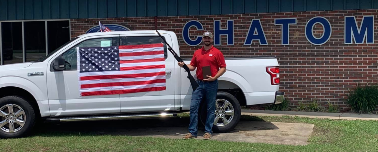 Chatom Ford in Alabama is giving away a free bible, American flag, and 12 gauge shotgun to anyone who purchases a new or preowned car from now until July 31. (Photo: Facebook)