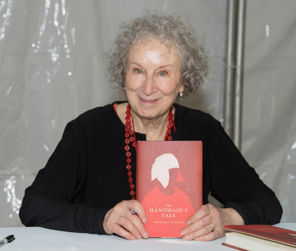 Copies of 'The Testaments' are on show as Canadian author Margaret Atwood poses during a photocall