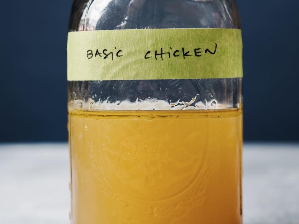 Chicken broth in a jar with label