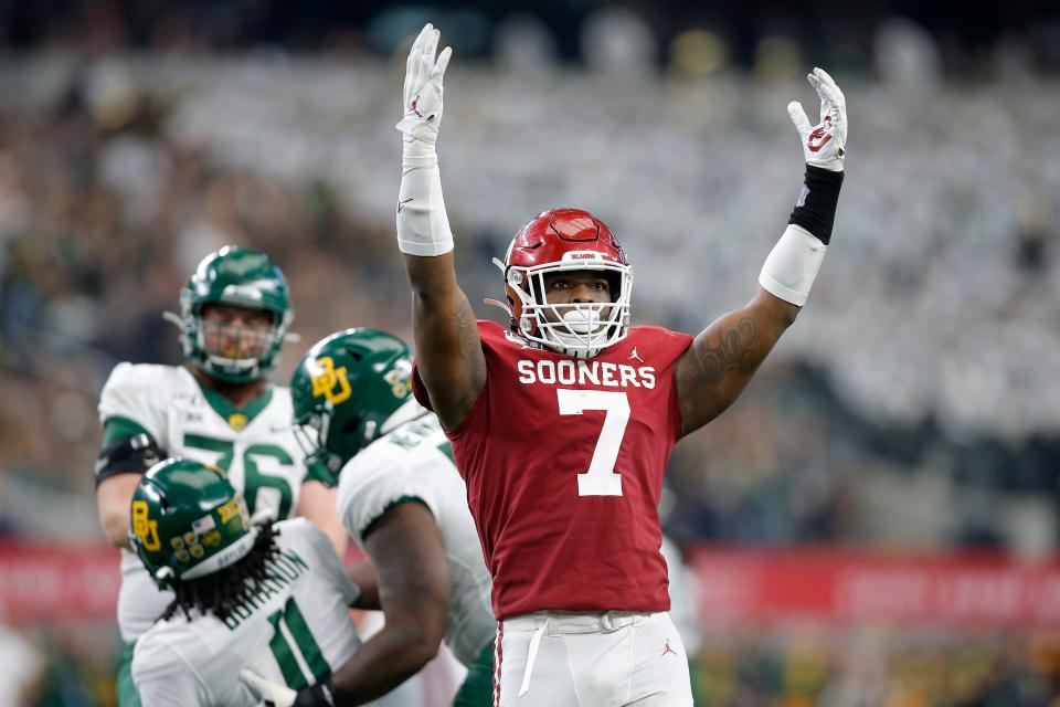 Oklahoma's Ronnie Perkins (7) celebrates during the Big 12 Championship Game between the University of Oklahoma Sooners (OU) and the Baylor University Bears at AT&T Stadium in Arlington, Texas, Saturday, Dec. 7, 2019. Oklahoma won 30-23. [Bryan Terry/The Oklahoman]