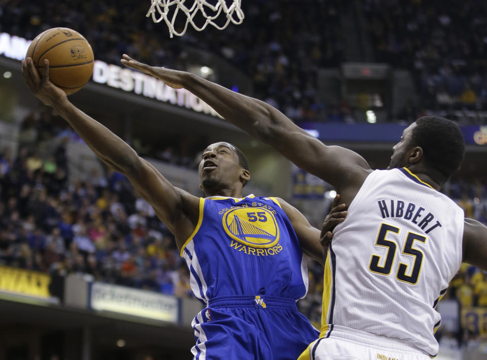 Golden State Warriors' Jordan Crawford (55) puts up a shot against Indiana Pacers' Roy Hibbert (55) during the first half of an NBA basketball game Tuesday, March 4, 2014, in Indianapolis. (AP Photo/Darron Cummings)