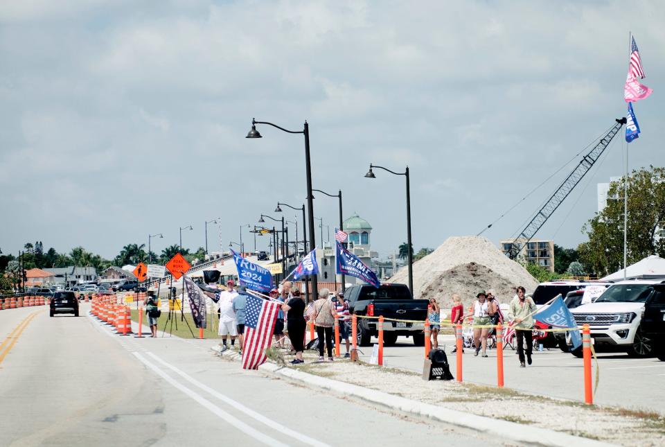 Supporters of Donald Trump and members of the media congregate Sunday along the Southern Causeway near Mar-a-Lago Club in Palm Beach.