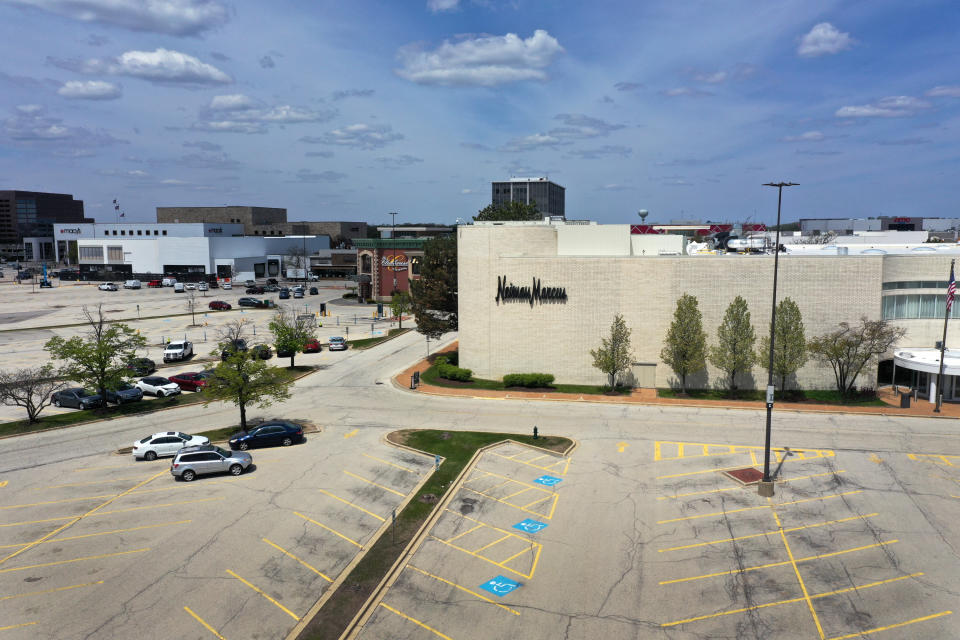 OAK BROOK, ILLINOIS - MAY 07: An aerial view from a drone shows the parking lot is nearly empty outside of a Neiman Marcus store that has been shuttered by the COVID-19 pandemic at Oak Brook Center shopping mall on May 07, 2020 in Oak Brook, Illinois. Neiman Marcus filed for bankruptcy today, making it the first major retailer to seek bankruptcy protection since the economic collapse brought on by the coronavirus pandemic.  (Photo by Scott Olson/Getty Images)