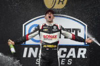 Rinus VeeKay, of the Netherlands, celebrates after winning the IndyCar auto race at Indianapolis Motor Speedway, Saturday, May 15, 2021, in Indianapolis. (AP Photo/Darron Cummings)