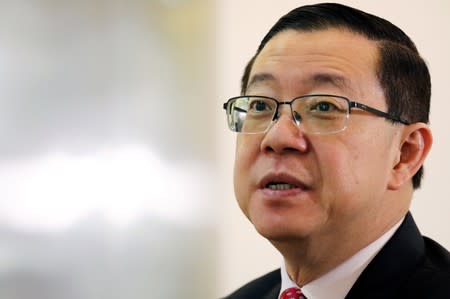 Malaysia's Finance Minister Lim Guan Eng speaks during an interview with Reuters in Putrajaya