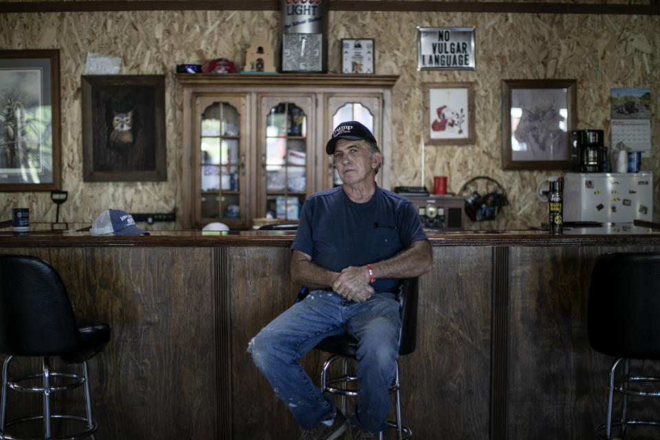 Rick Warren 65, poses for a portrait in The Gunsmoke Club Tuesday, Aug. 4, 2020, in West Vienna, Ill. "I've had Black friends. I've had Black babysitters. I had Black people who took care of me through my childhood," he said. But the easygoing race relations of his youth were lost, he said, when President Lyndon Johnson, who pushed through some of the most important civil rights legislation of the 20th century, "came along and turned it into a bunch of racial bullshit!" (AP Photo/Wong Maye-E)