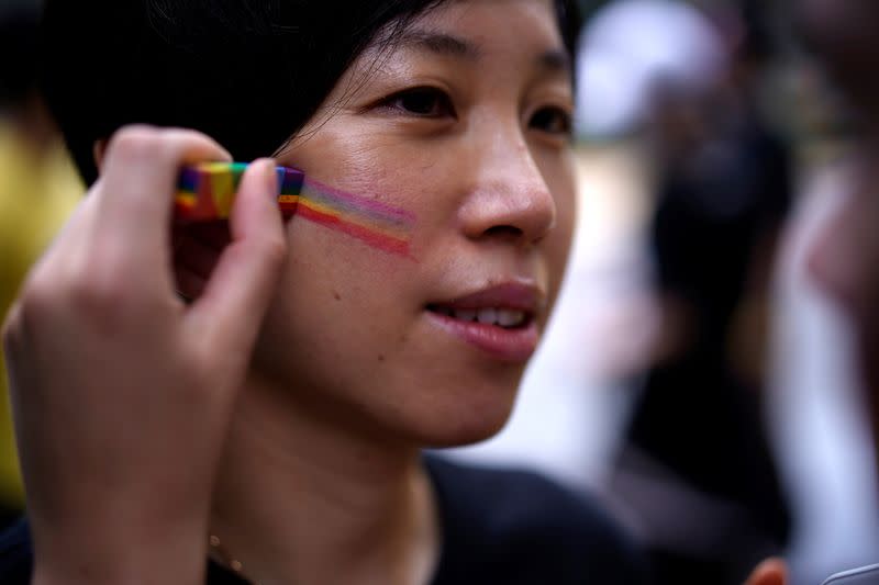 A participant takes part in a Pride Run during the Shanghai Pride festival, in Shanghai