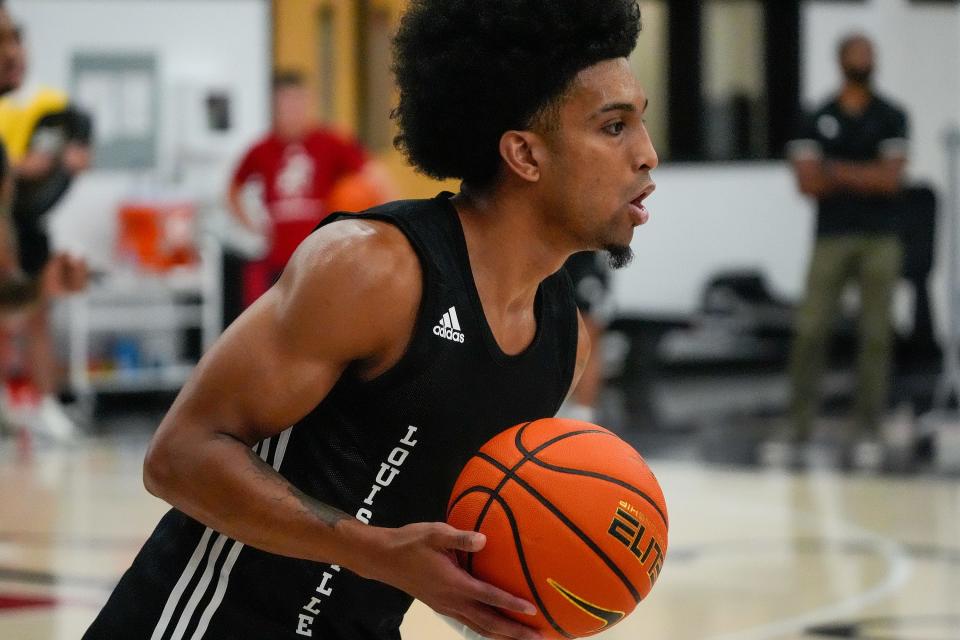 Chucky Hepburn drives upcourt during practice before the Cards headed to the Bahamas.