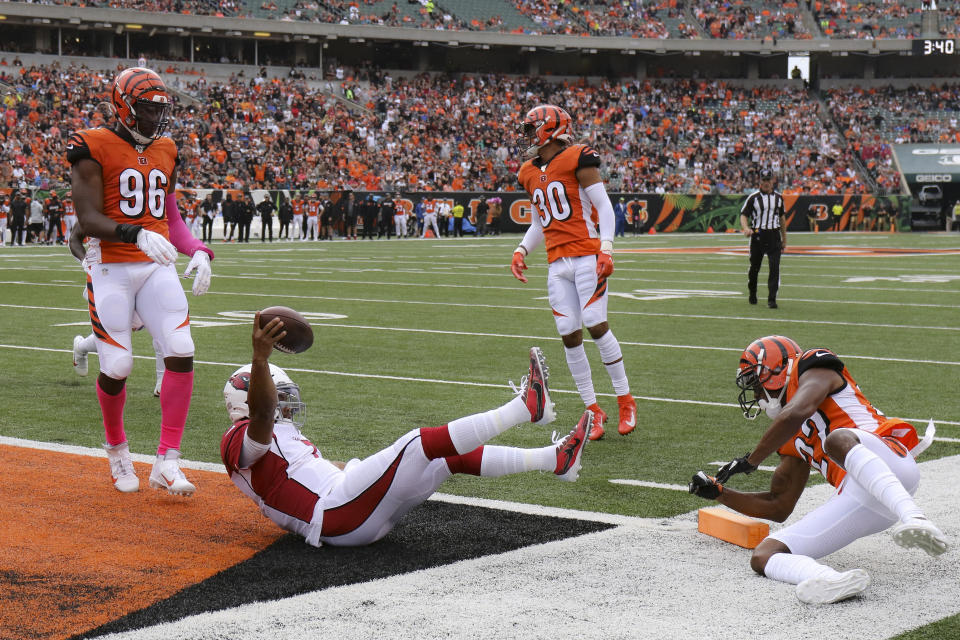 Arizona Cardinals quarterback Kyler Murray (1) leaps in for a touchdown against Cincinnati Bengals cornerback William Jackson (22) in the first half of an NFL football game, Sunday, Oct. 6, 2019, in Cincinnati. (AP Photo/Gary Landers)