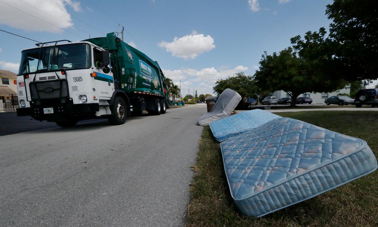 Cape Coral has asked a contractor to research the costs of a  taking over solid waste disposal. Currently, Waste Pro has the contract. Here, a Waste Pro garbage truck collects trash along a neighborhood south of Cape Coral Parkway Monday, April 5, 2021.