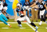 Nov 13, 2017; Charlotte, NC, USA; Carolina Panthers running back Christian McCaffrey (22) runs the ball during the first quarter against the Miami Dolphins at Bank of America Stadium. Jeremy Brevard-USA TODAY Sports