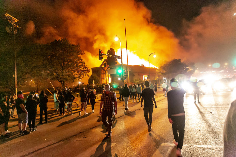 A shop was set on fire on Thursday, during the third day of protests over the death of George Floyd in Minneapolis. (Jordan Strowder/Anadolu Agency via Getty Images)