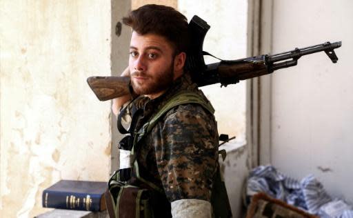 Rosaries and rifles: Syria Christians take on IS in Raqa