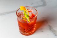 <p><strong>Ingredients</strong></p><p>1.5 oz Knob Creek Bourbon<br>.75 oz Campari<br>.75 oz Amaro Nonino<br>.5 oz Del Maguey Vida Mezcal<br>3 drops Bittermans Ginger Bitters</p><p><strong>Instructions</strong></p><p>Add all ingredients to a mixing glass. Stir and strain. Pour into double rocks glass and garnish with orange and lime twist</p><p><em>By Marshall Minaya for <a href="https://www.valerienewyorkcity.com/" rel="nofollow noopener" target="_blank" data-ylk="slk:Valerie;elm:context_link;itc:0;sec:content-canvas" class="link ">Valerie</a>, NYC</em></p>