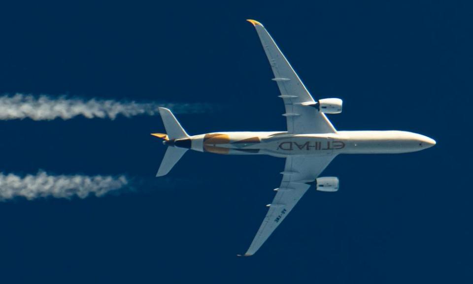 A view from below an Etihad Airways plane 