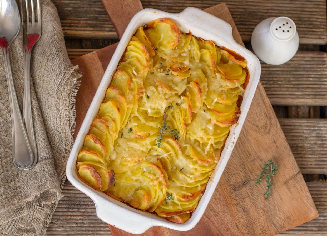 Sliced potatoes baked in cream and cheese Gratin dauphinois