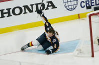 Colorado Avalanche's Cale Makar (8) falls during the NHL All Star Skills Showcase, Friday, Feb. 3, 2023, in Sunrise, Fla. (AP Photo/Marta Lavandier)