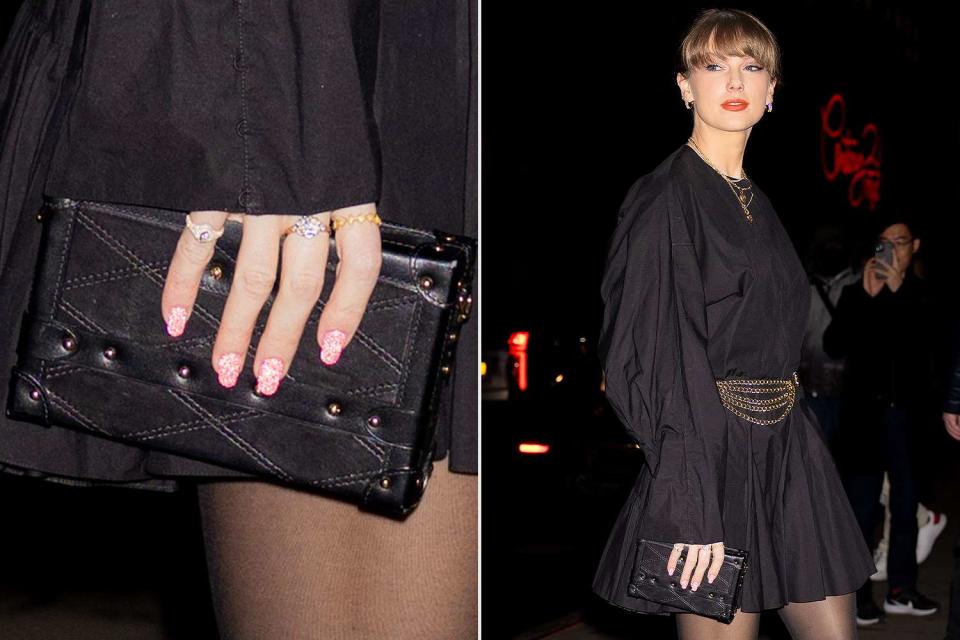 <p>WavyPeter/SplashNews.com</p> Taylor Swift rocks "Lover"-coded nails while out with Brittany Mahomes and Cara Delevingne  in New York City on Jan. 23