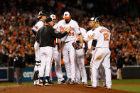 Manager Buck Showalter of the Baltimore Orioles takes starting pitcher Jason Hammel #39 in the top of the sixth inning against the New York Yankees during Game One of the American League Division Series at Oriole Park at Camden Yards on October 7, 2012 in Baltimore, Maryland. (Photo by Rob Carr/Getty Images)