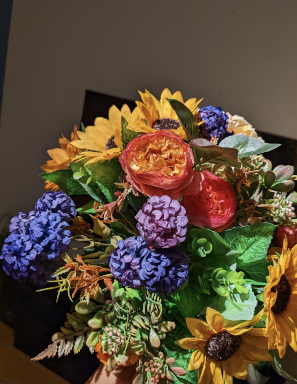 A bouquet of colorful fake flowers