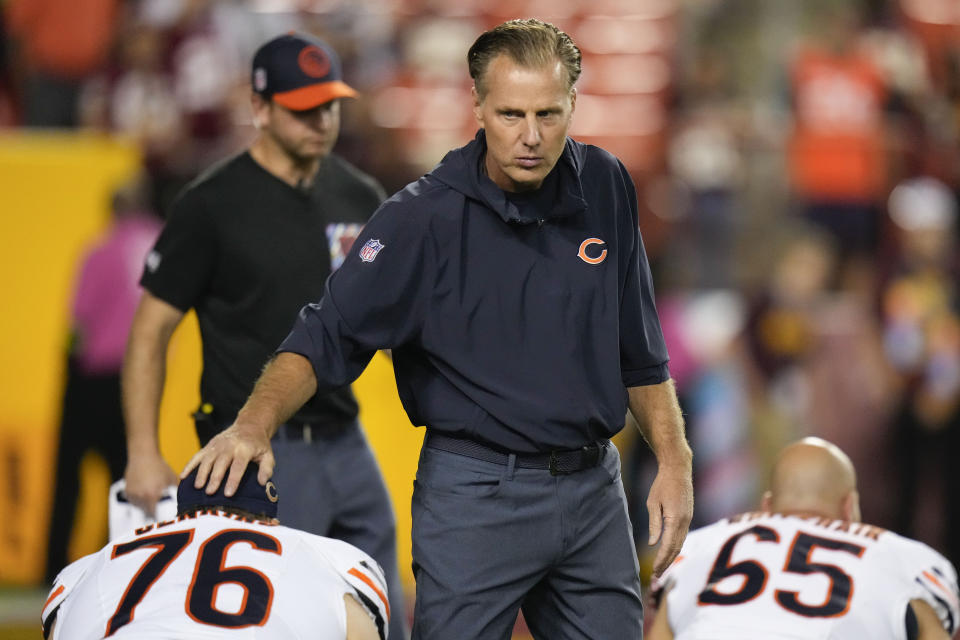 Chicago Bears head coach Matt Eberflus greeting offensive tackle Teven Jenkins (76) before the start of an NFL football game against the Washington Commanders, Thursday, Oct. 5, 2023, in Landover, Md. (AP Photo/Alex Brandon)