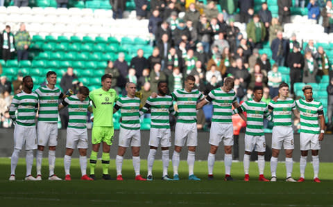 Celtic's players join together before the game - Credit: PA