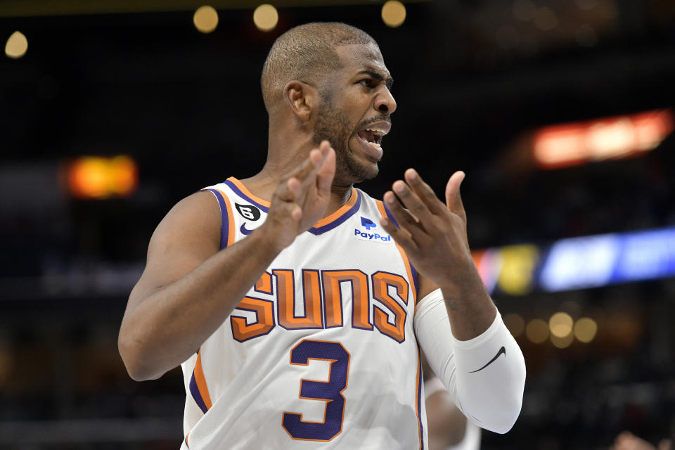 Phoenix Suns guard Chris Paul (3) reacts in the first half of an NBA basketball game against the Memphis Grizzlies Tuesday, Dec. 27, 2022, in Memphis, Tenn. (AP Photo/Brandon Dill)
