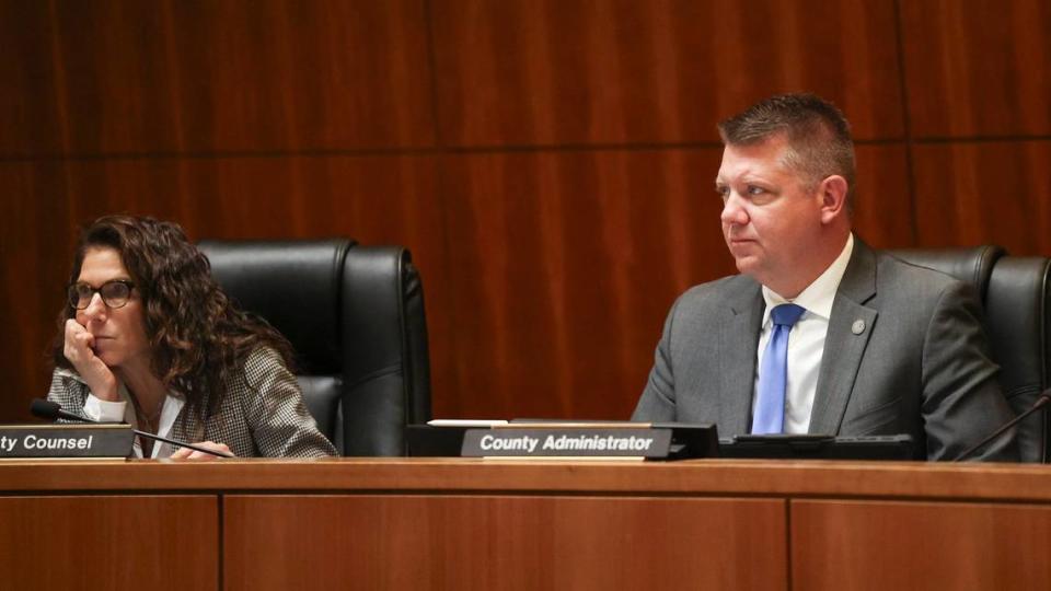 San Luis Obispo County Counsel Rita Neal and County Administrative Officer Matt Pontes listen to the San Luis Obispo County Board of Supervisors meeting on May 21, 2024.