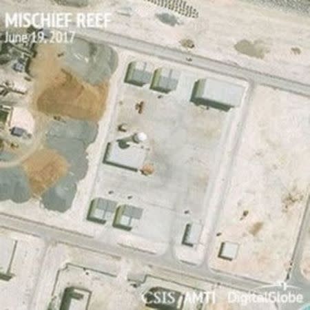 Construction is shown on Mischief Reef, in the Spratly Islands, the disputed South China Sea in this June 19, 2017 satellite image released by CSIS Asia Maritime Transparency Initiative at the Center for Strategic and International Studies (CSIS) to Reuters on June 29, 2017. MANDATORY CREDIT CSIS/AMTI DigitalGlobe/Handout via REUTERS