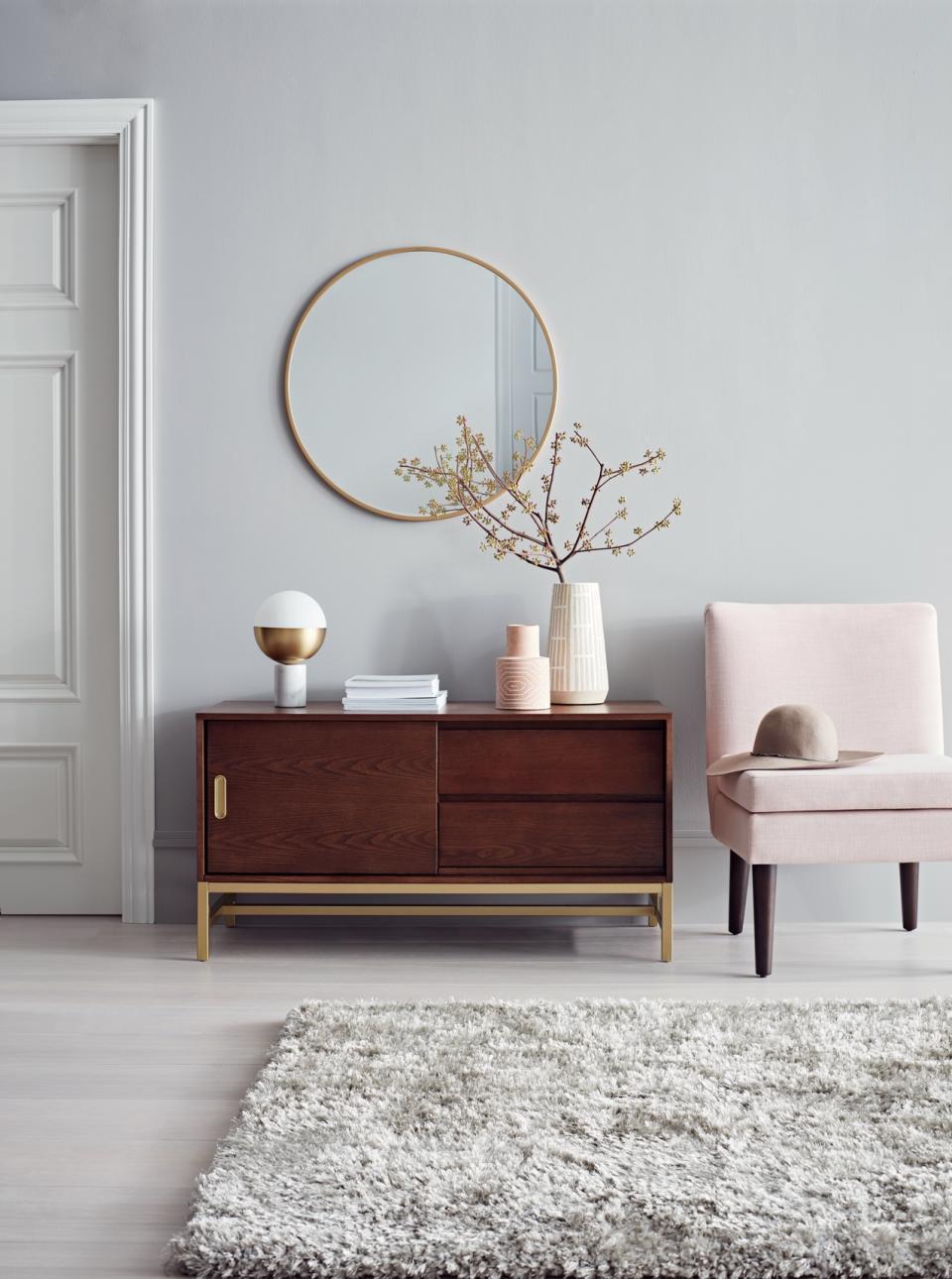 Wood and gold-accented cabinet