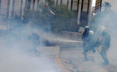 Protesters clash with police officers during a demonstration against the agreement reached by Greece and Macedonia to resolve a dispute over the former Yugoslav republic's name, in Athens, Greece, January 20, 2019. REUTERS/Alkis Konstantinidis