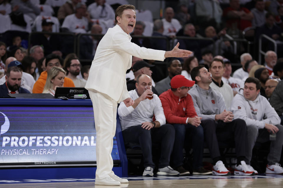 St. John's head coach Rick Pitino directs his team against Creighton during the first half of an NCAA college basketball game Sunday, Feb. 25, 2024, in New York. (AP Photo/Adam Hunger)