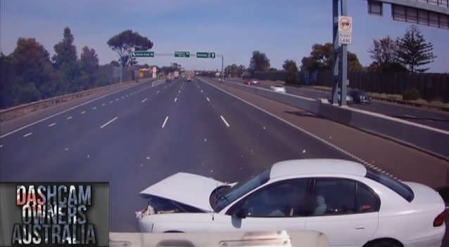 An out of control car comes to a stop in front of an oncoming truck on the Princes Freeway near Point Cook. Photo: Dash Cam Owners Australia