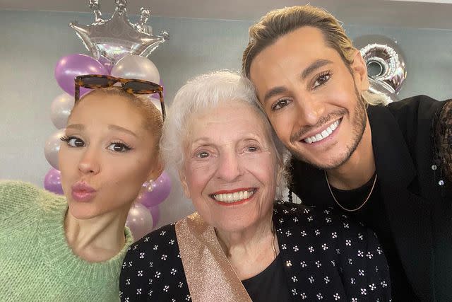 <p>Frankie James Grande/Instagram</p> Ariana Grande with her brother Frankie Grande and grandmother Marjorie Grande celebrating her 98th birthday in October 2023.