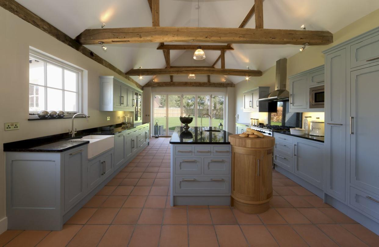 farmhouse kitchen with terracotta floors