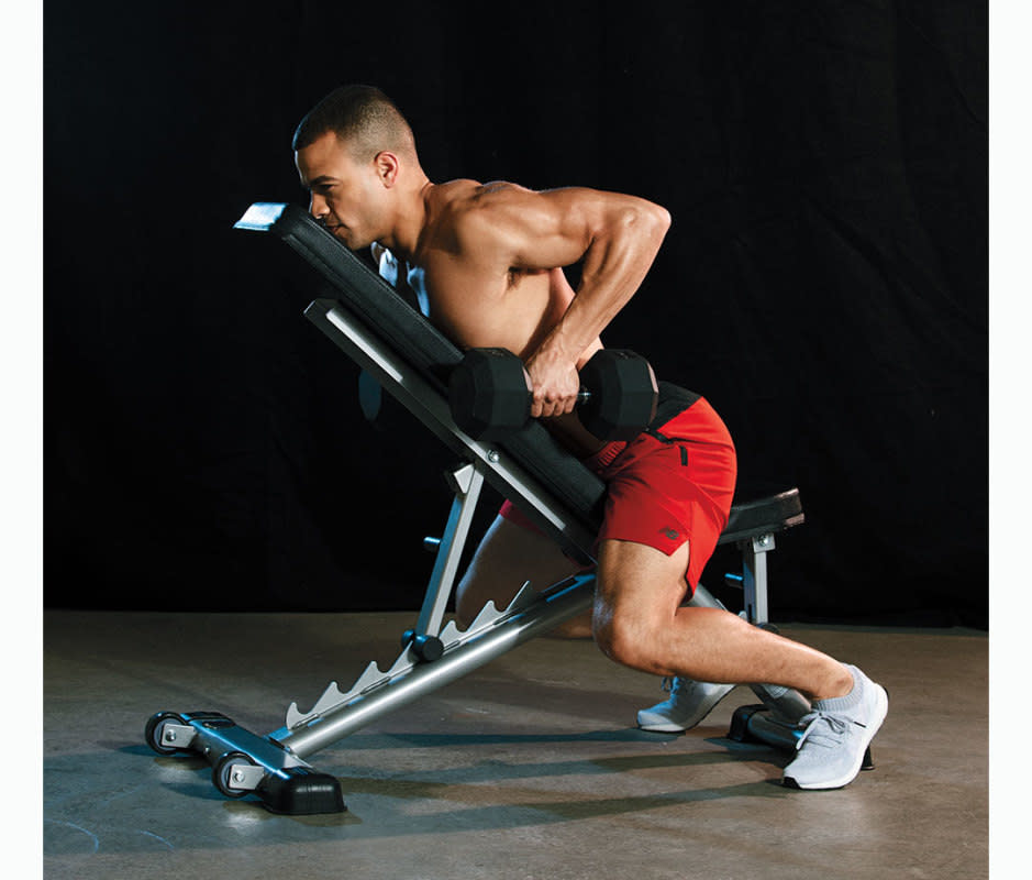 How to do it:<ul><li>Straddle the seat of an incline bench and lie chest down, holding a dumbbell in each hand with palms facing in, both feet on the floor.</li><li>Retract your shoulder blades and row both dumbbells parallel to your hips.</li></ul>
